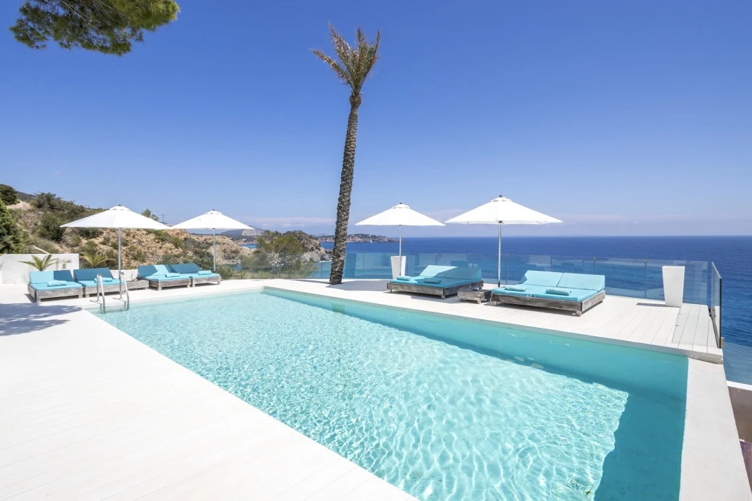 1681216750-Luxury real estates Ibiza to rent villa Raya Main pool 2 .webp